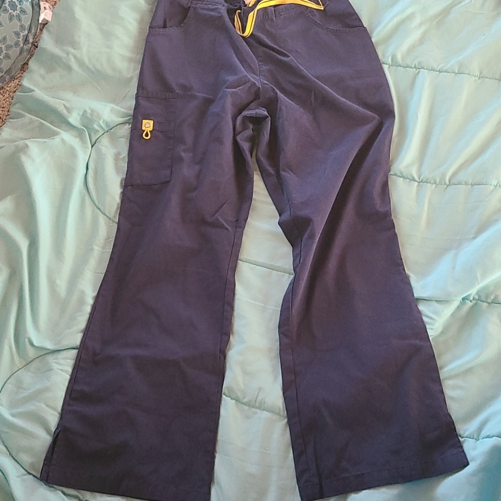 Wondering woman's scrub pants